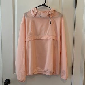 Light pink Nike wind breaker, never worn! Size: Large
